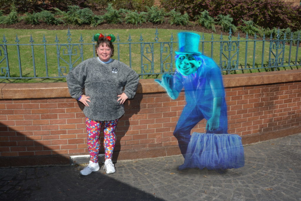 Personal PhotoPass picture with magic in front of Haunted Mansion