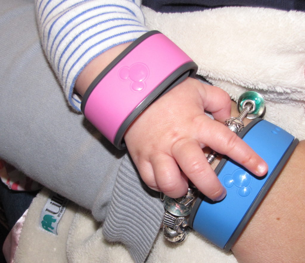 MagicBands on adult and baby