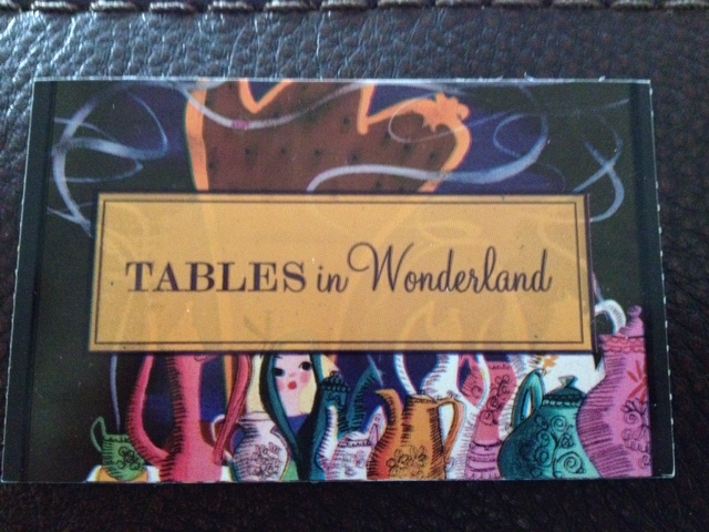 Tables in Wonderland card
